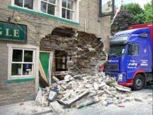 A lorry has crashed into a pub and caused impact damage.